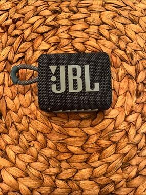 JBL Black Portable Speaker with Gray Logo and Braided Loop